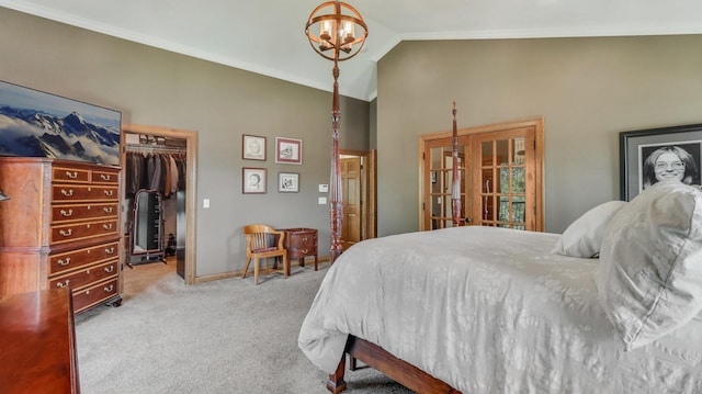 3946 Woodcrest Ct, Eau Claire, WI 54701 - bedroom featuring carpet floors, lofted ceiling, ornamental molding, a walk in closet, and a chandelier