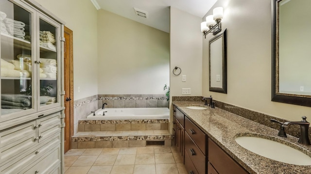 3946 Woodcrest Ct, Eau Claire, WI 54701 - full bathroom featuring double vanity, a garden tub, and tile patterned flooring