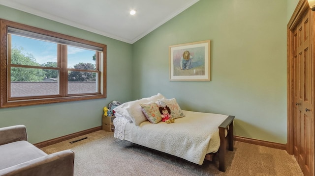 3946 Woodcrest Ct, Eau Claire, WI 54701 - bedroom featuring vaulted ceiling, ornamental molding, carpet flooring, and a closet