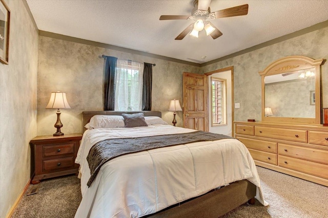 N12943 600th St, Wilson, WI 54772 - bedroom with carpet, a ceiling fan, and a textured ceiling