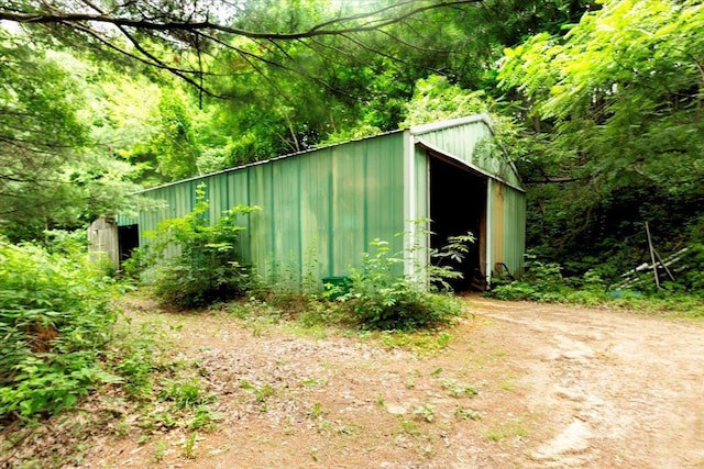 N12943 600th St, Wilson, WI 54772 - view of outbuilding with a wooded view