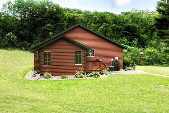 N12943 600th St, Wilson, WI 54772 - view of home's exterior featuring a yard and a deck