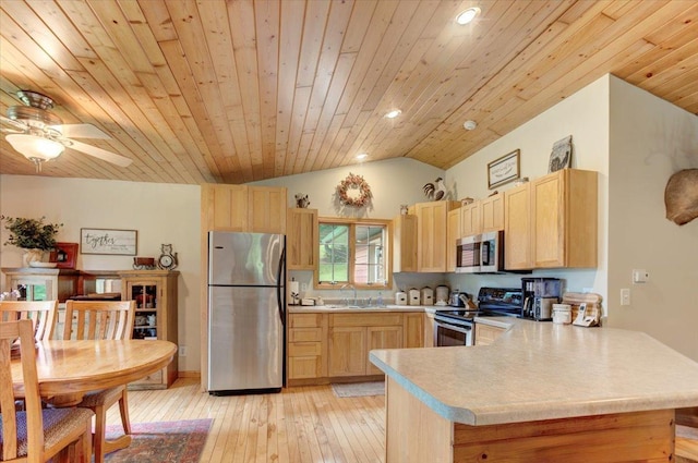 N12943 600th St, Wilson, WI 54772 - kitchen featuring appliances with stainless steel finishes, light brown cabinetry, lofted ceiling, wood ceiling, and light countertops
