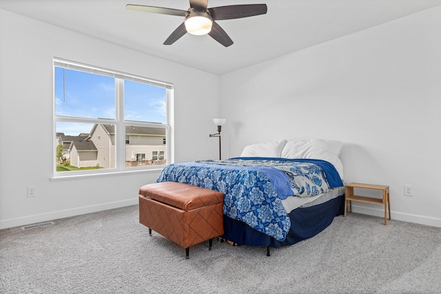 11374 81st St NE, Otsego, MN 55330 - carpeted bedroom with baseboards and a ceiling fan