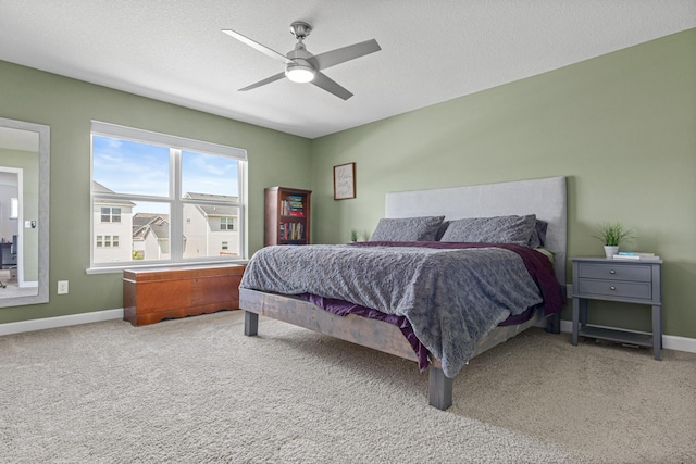 11374 81st St NE, Otsego, MN 55330 - carpeted bedroom with baseboards and a ceiling fan