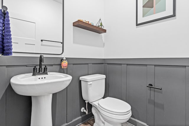 11374 81st St NE, Otsego, MN 55330 - bathroom with wood finished floors and wainscoting