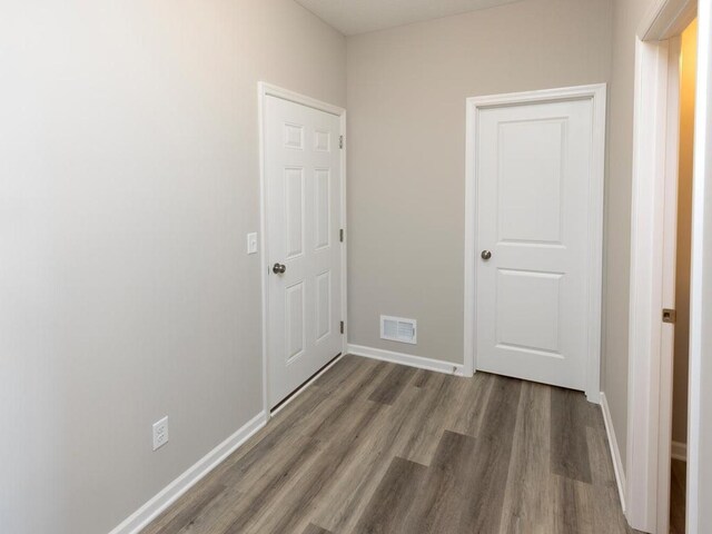 3235 Jandura Ave NE, Saint Michael, MN 55376 - unfurnished bedroom featuring wood finished floors