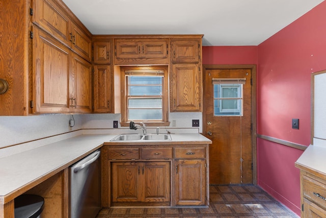 4251 Quincy St NE, Columbia Heights, MN 55421 - kitchen featuring stainless steel dishwasher, brown cabinets, and light countertops