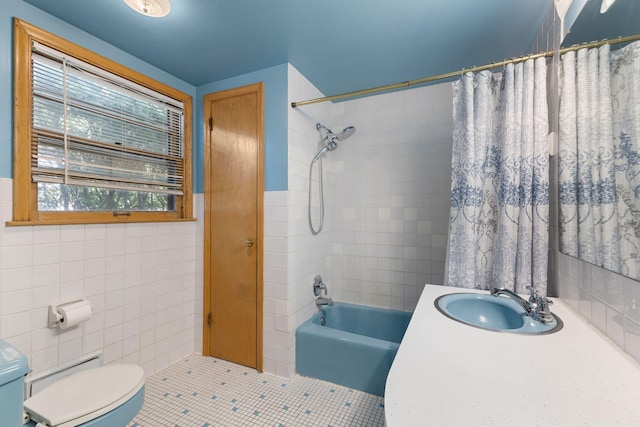 4251 Quincy St NE, Columbia Heights, MN 55421 - full bathroom featuring tile walls, tile patterned floors, shower / bath combo, vanity, and baseboard heating