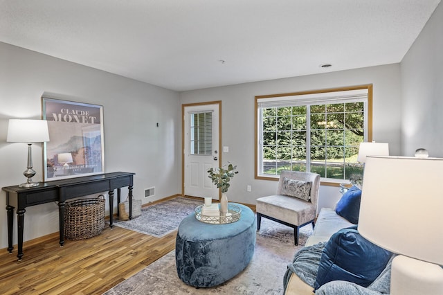 8484 Minuteman Alcove, Eden Prairie, MN 55344 - sitting room with wood finished floors and baseboards