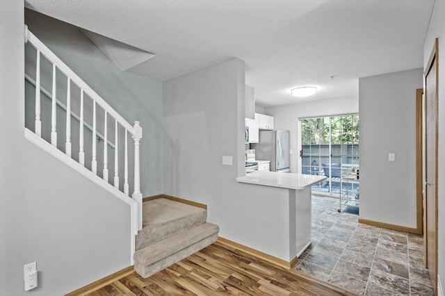 8484 Minuteman Alcove, Eden Prairie, MN 55344 - stairs with baseboards and a textured ceiling