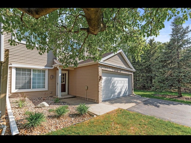 8484 Minuteman Alcove, Eden Prairie, MN 55344 - view of front of home featuring a garage