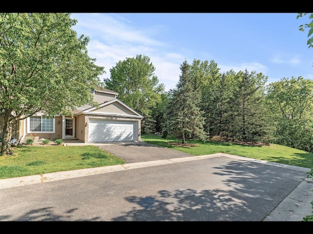 8484 Minuteman Alcove, Eden Prairie, MN 55344 - view of front of house featuring a front lawn, driveway, and an attached garage
