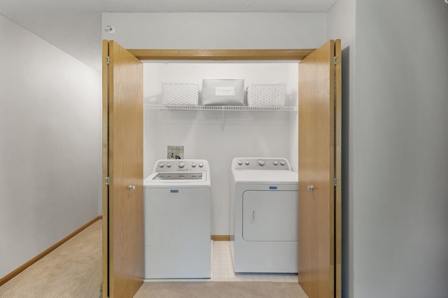 8484 Minuteman Alcove, Eden Prairie, MN 55344 - laundry area featuring washing machine and clothes dryer and light carpet