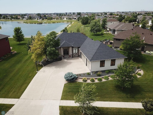 4703 Woodhaven St S, Fargo, ND 58104 - aerial perspective of suburban area featuring a large body of water