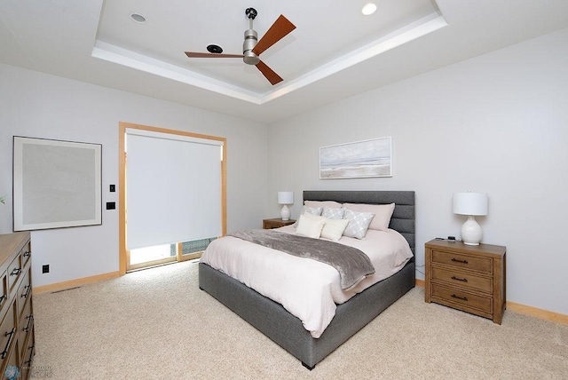 4703 Woodhaven St S, Fargo, ND 58104 - bedroom with a tray ceiling, light colored carpet, ceiling fan, and recessed lighting