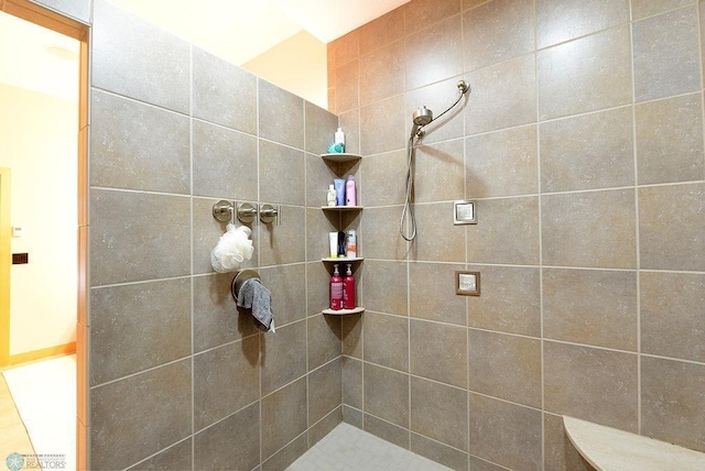 4703 Woodhaven St S, Fargo, ND 58104 - full bathroom featuring a tile shower