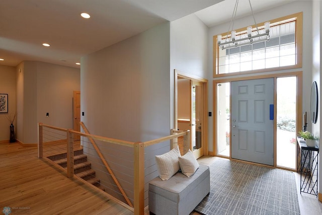 4703 Woodhaven St S, Fargo, ND 58104 - entrance foyer featuring wood finished floors, recessed lighting, and a high ceiling