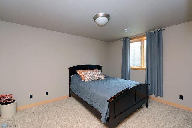4703 Woodhaven St S, Fargo, ND 58104 - bedroom with light colored carpet