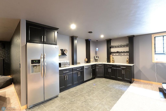 4703 Woodhaven St S, Fargo, ND 58104 - kitchen with appliances with stainless steel finishes, light countertops, open shelves, dark cabinets, and recessed lighting