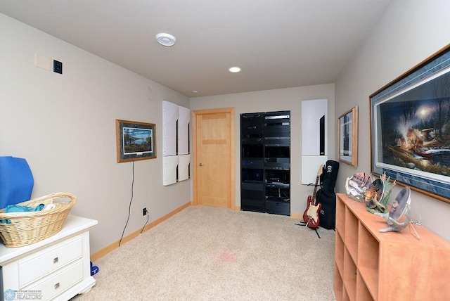 4703 Woodhaven St S, Fargo, ND 58104 - sitting room with carpet and recessed lighting