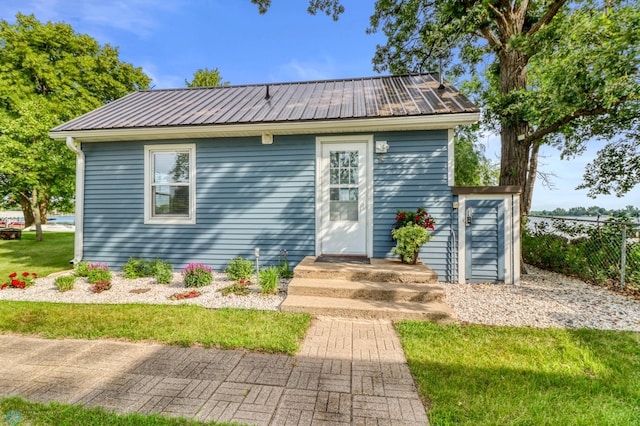 27096 Little Floyd Lake Rd Unit 8, Detroit Twp, MN 56501 - view of front facade featuring a metal roof