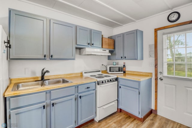 27096 Little Floyd Lake Rd Unit 8, Detroit Twp, MN 56501 - kitchen featuring white range with electric stovetop, under cabinet range hood, stainless steel microwave, light wood-style floors, and light countertops