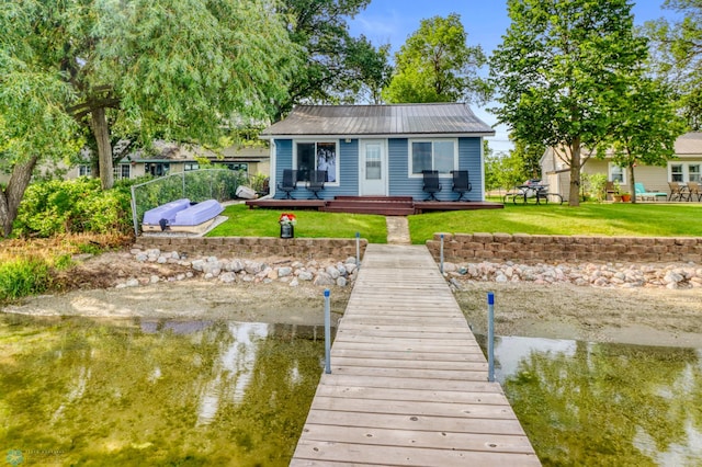 27096 Little Floyd Lake Rd Unit 8, Detroit Twp, MN 56501 - rear view of property with a yard, a metal roof, and a deck