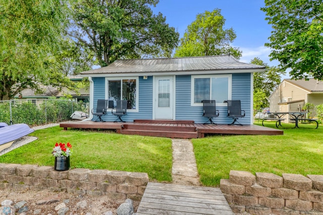 27096 Little Floyd Lake Rd Unit 8, Detroit Twp, MN 56501 - rear view of house featuring a deck and a metal roof