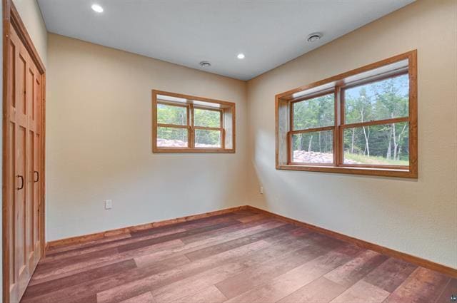 12207 Railroad Rd, Lake Nebagamon, WI 54849 - empty room featuring wood finished floors and recessed lighting