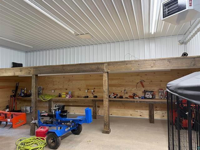 12207 Railroad Rd, Lake Nebagamon, WI 54849 - garage with wooden walls