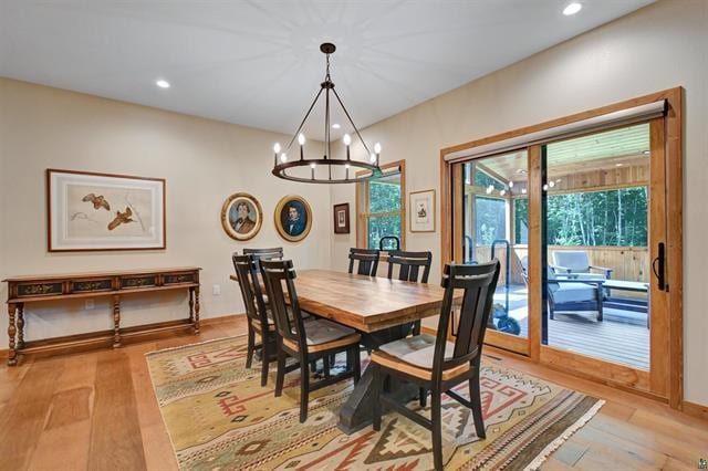 12207 Railroad Rd, Lake Nebagamon, WI 54849 - dining space featuring a chandelier, light wood-style floors, and recessed lighting