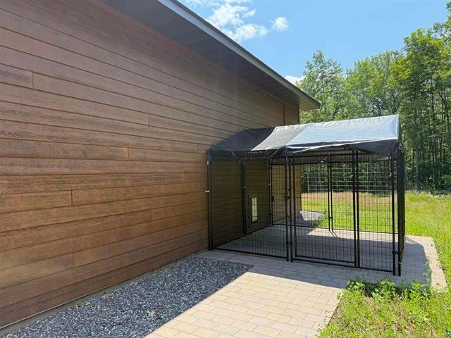 12207 Railroad Rd, Lake Nebagamon, WI 54849 - view of side of property with an exterior structure and an outdoor structure