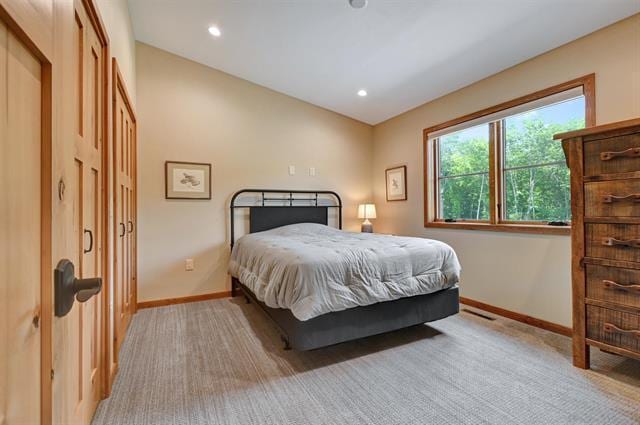 12207 Railroad Rd, Lake Nebagamon, WI 54849 - bedroom with recessed lighting and light carpet
