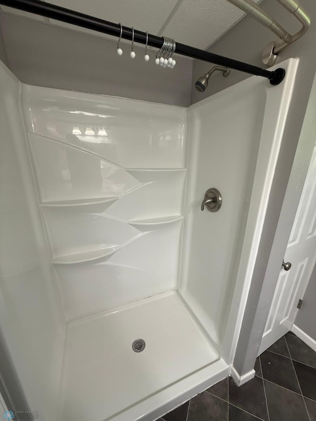 1303 Duluth Ave N, Thief River Falls, MN 56701 - full bath featuring tile patterned floors and a shower