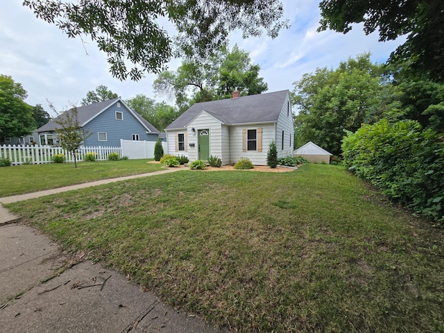 818 Kenwood St, Alexandria, MN 56308 - bungalow-style home featuring a chimney