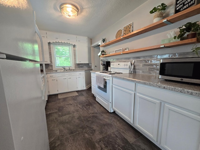 818 Kenwood St, Alexandria, MN 56308 - kitchen with white appliances, open shelves, decorative backsplash, white cabinets, and a textured ceiling