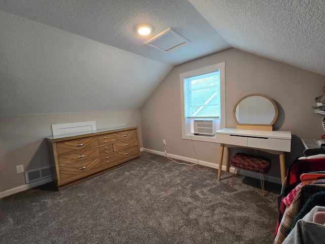818 Kenwood St, Alexandria, MN 56308 - additional living space featuring a textured ceiling, lofted ceiling, cooling unit, and dark carpet