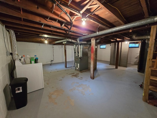 818 Kenwood St, Alexandria, MN 56308 - basement with heating unit and separate washer and dryer