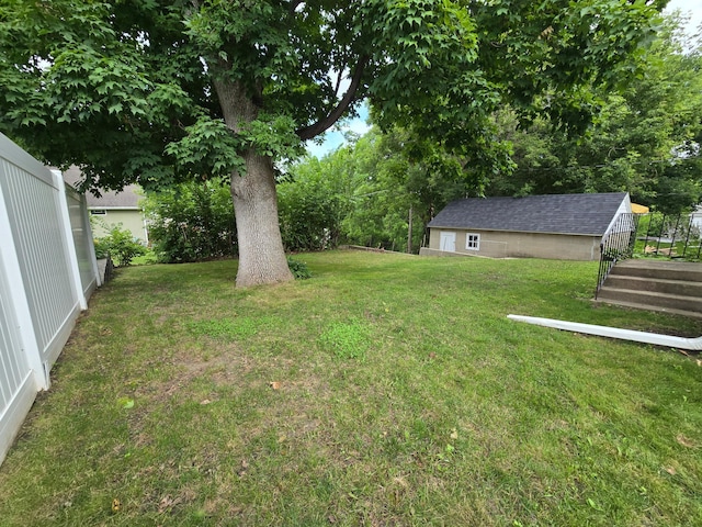 818 Kenwood St, Alexandria, MN 56308 - view of green lawn featuring an outbuilding
