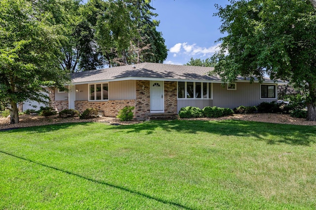 4801 Louisiana Ave N, Crystal, MN 55428 - ranch-style home featuring brick siding and a front lawn