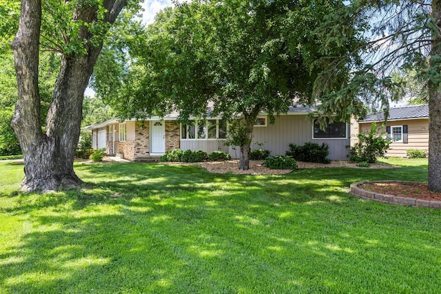 4801 Louisiana Ave N, Crystal, MN 55428 - single story home with a front lawn and brick siding