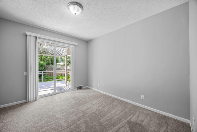 4801 Louisiana Ave N, Crystal, MN 55428 - unfurnished room with a textured ceiling and carpet floors