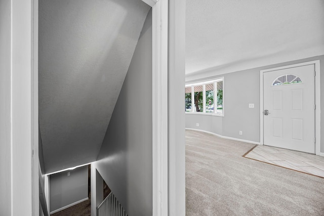 4801 Louisiana Ave N, Crystal, MN 55428 - carpeted entryway featuring baseboards