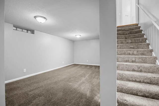 4801 Louisiana Ave N, Crystal, MN 55428 - finished basement featuring a textured ceiling, stairs, and carpet flooring