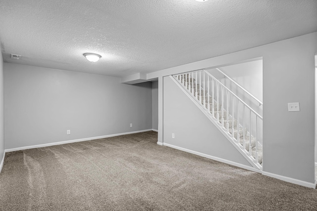 4801 Louisiana Ave N, Crystal, MN 55428 - finished below grade area with carpet, a textured ceiling, and stairway