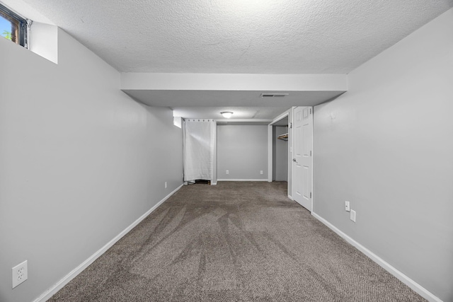 4801 Louisiana Ave N, Crystal, MN 55428 - below grade area with carpet floors and a textured ceiling