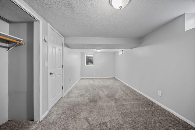 4801 Louisiana Ave N, Crystal, MN 55428 - below grade area featuring carpet and a textured ceiling