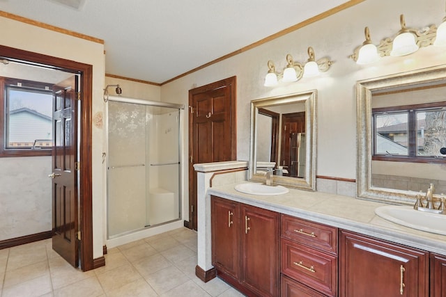 11228 River Rd, Champlin, MN 55316 - bathroom with a shower stall, crown molding, double vanity, and tile patterned floors