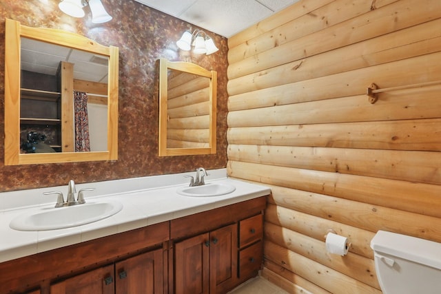 11228 River Rd, Champlin, MN 55316 - full bath with log walls and double vanity